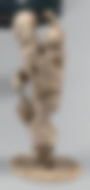 Ivory okimono representing a standing peasant carrying a child on his back, and holding a bunch of grapes (preview)