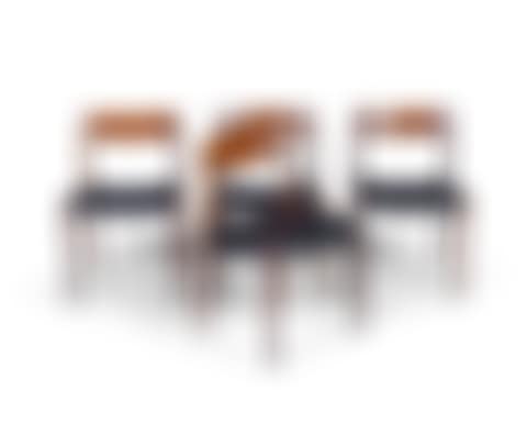 A set of four Model 77 rosewood chairs; Niels Otto Møller with black leather seats (preview)