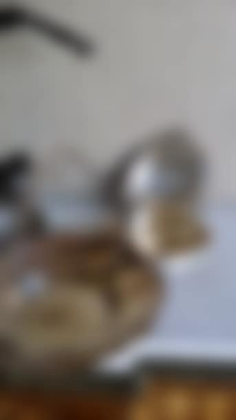 Another silver-plated metal lot comprising 2 bottle coasters with engraved decoration (preview)