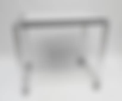 DESERTE TABLE on castors with chrome-plated metal tubular uprights and wooden top (preview)