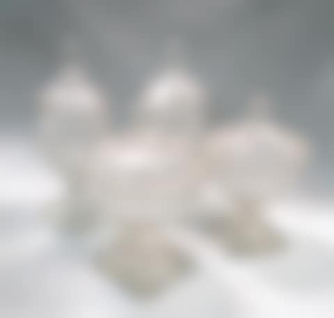 A pair of cut glass bon-bon jars and covers (preview)