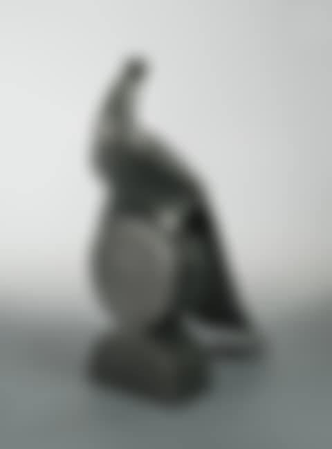 A modern patinated composition figure of a peacock (preview)