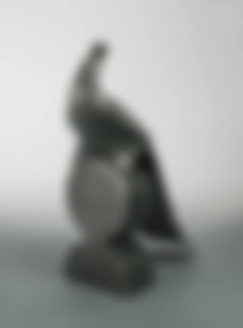 A modern patinated composition figure of a peacock (preview)