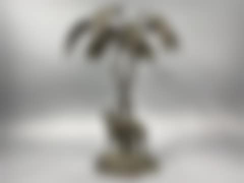 Bronze centerpiece representing a greyhound under a palm tree (preview)