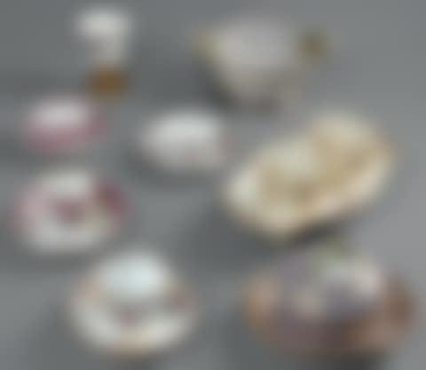 Cup and saucer with pink monochrome decoration of pierced rocks and Indian flowers (preview)