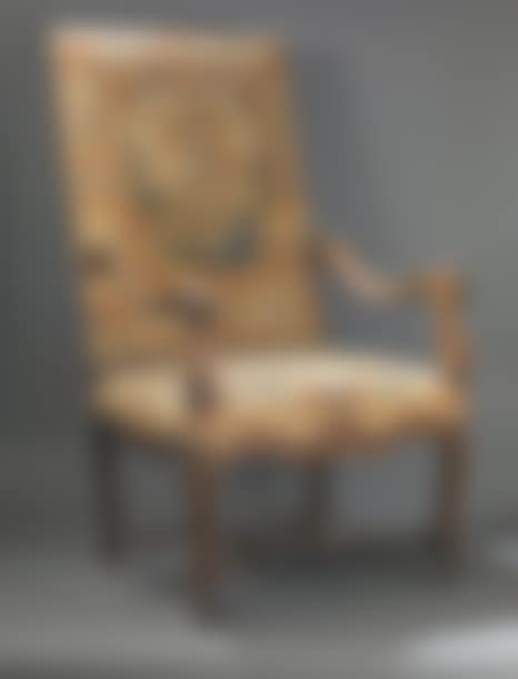 Molded and carved walnut armchair decorated with shells, foliage and scrolls (preview)