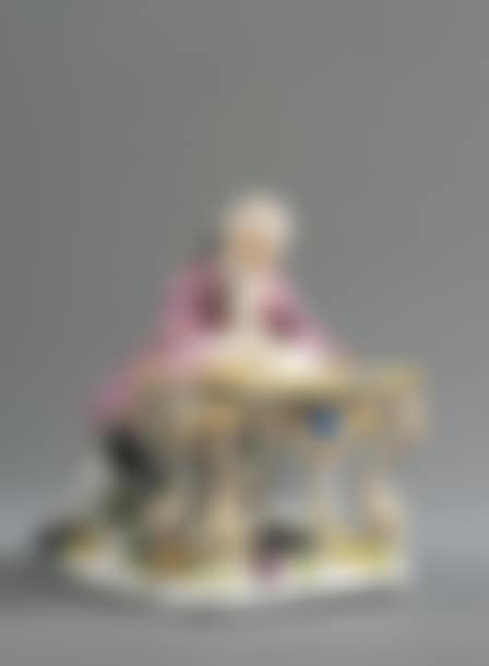 Statuette representing a man sitting at a desk writing a letter (preview)