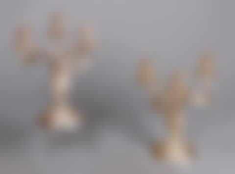 PAIR OF CANDELABRA with three silver light arms decorated with twisted fluting, clasps and acanthus leaves (preview)