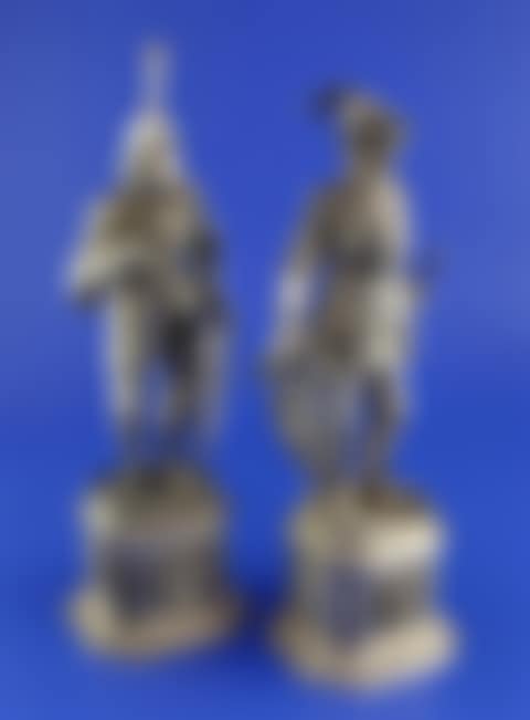 A pair of early 20th century German parcel gilt silver and carved ivory figures (preview)