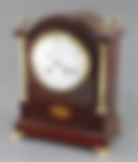 An Edwardian Mappin & Webb brass mounted mahogany mantel clock (preview)