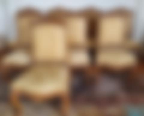 Suite of eight molded and carved natural wood chairs (preview)