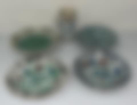 Iznik earthenware lot; earthenware pitcher with tulip decoration; two earthenware dishes with polychrome decoration of flowers; earthenware dishes with green vegetal decor; earthenware soup plate with stylized vegetal decor (preview)